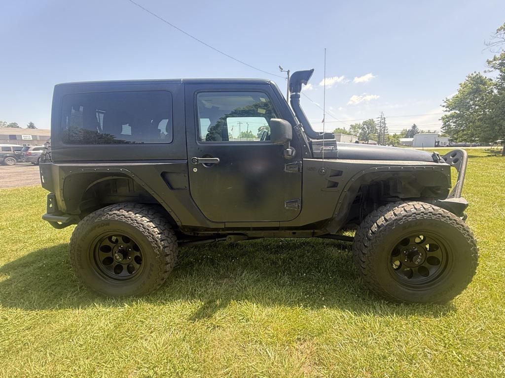 used 2014 Jeep Wrangler car, priced at $14,153