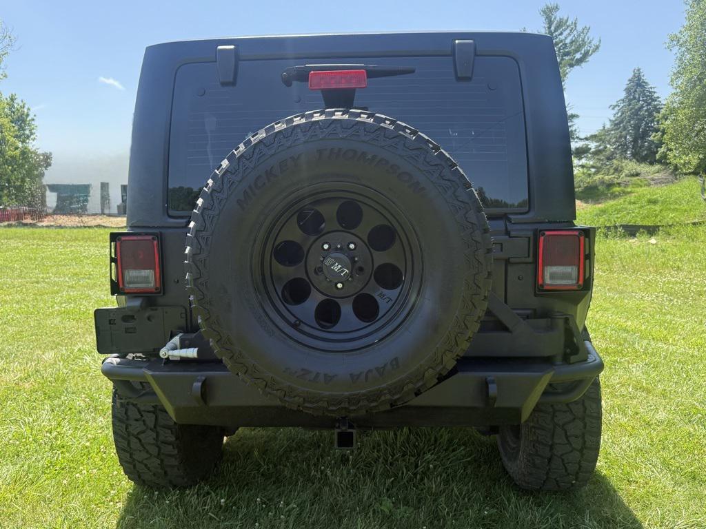used 2014 Jeep Wrangler car, priced at $14,153