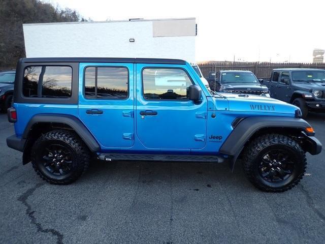 used 2021 Jeep Wrangler Unlimited car, priced at $30,452
