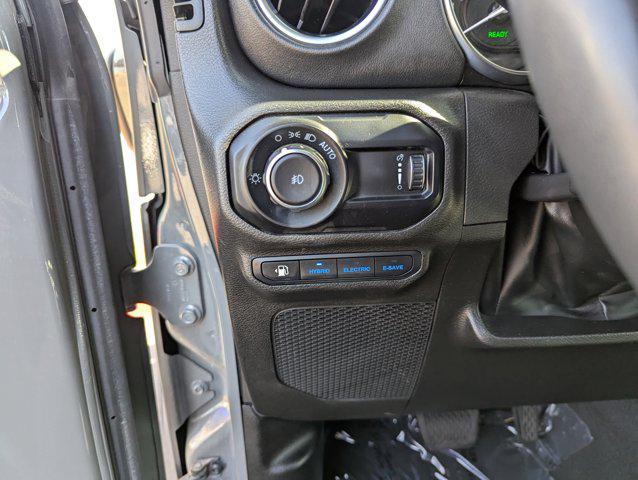 used 2023 Jeep Wrangler 4xe car, priced at $29,998