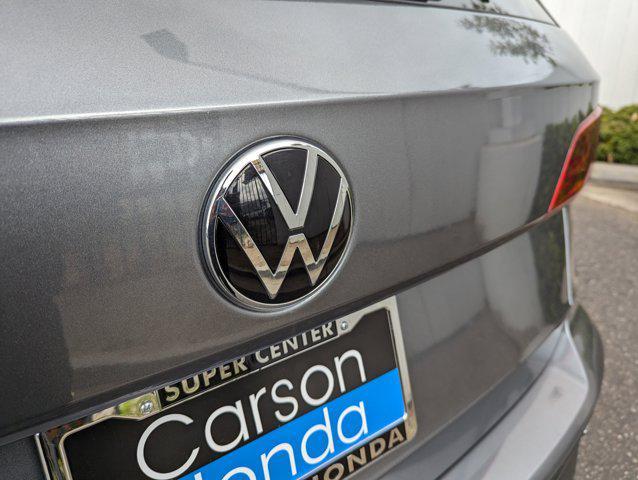 used 2024 Volkswagen Taos car, priced at $20,997
