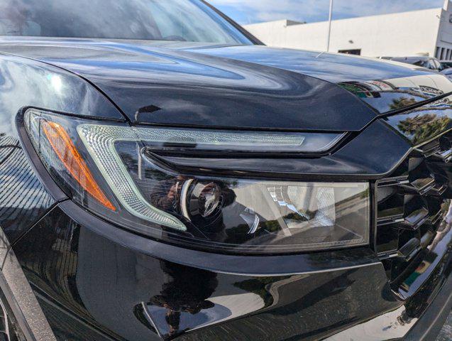 used 2023 Honda Passport car, priced at $35,998