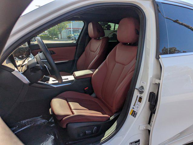 used 2024 BMW 330e car, priced at $39,498