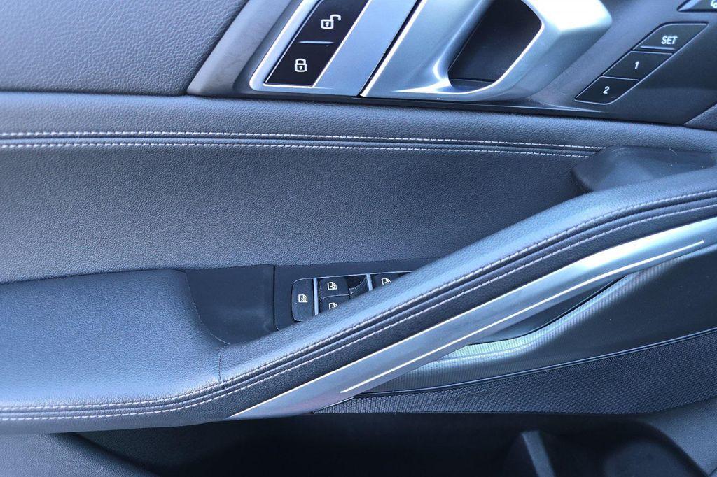 used 2022 BMW X6 car, priced at $50,900