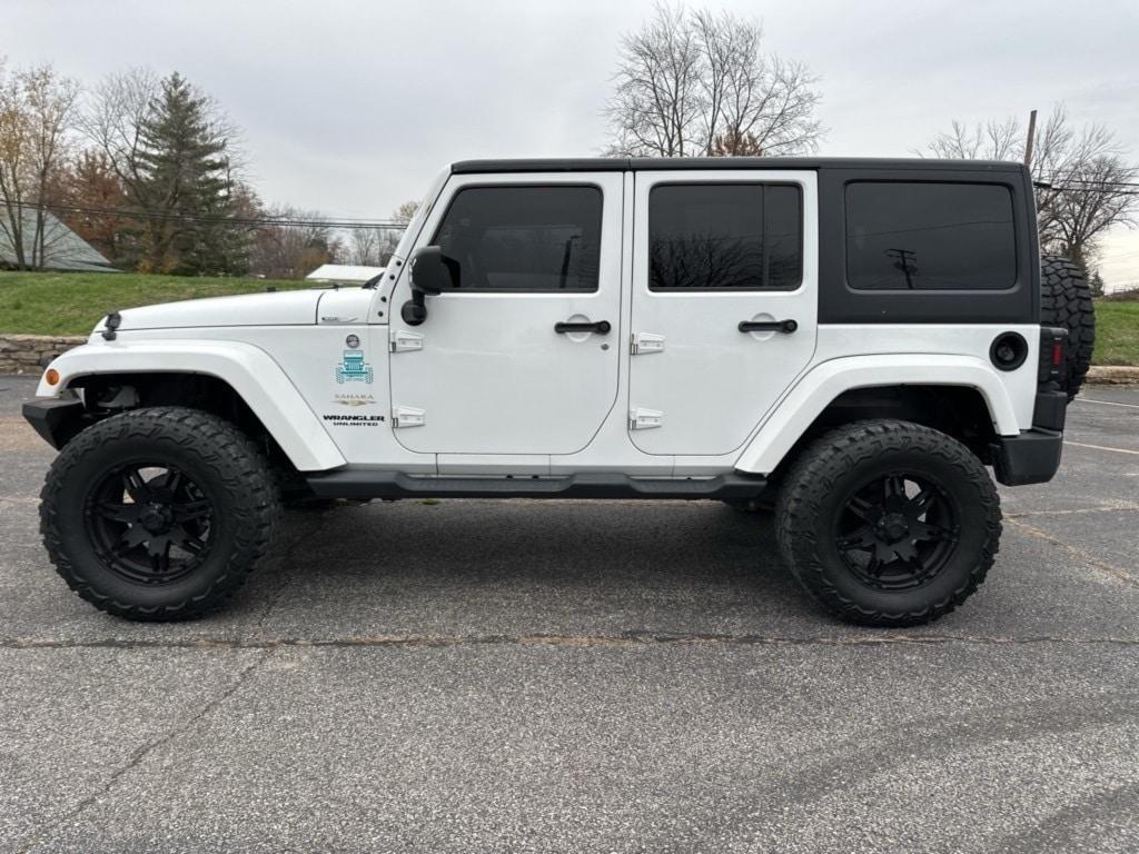 used 2015 Jeep Wrangler Unlimited car, priced at $19,243