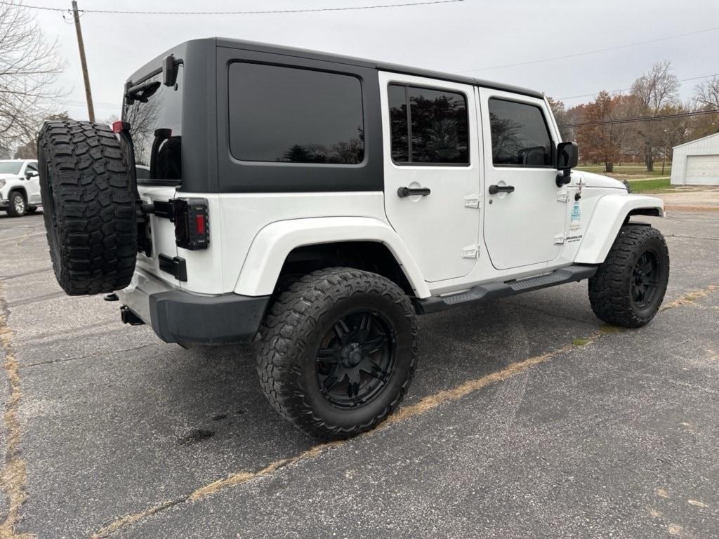 used 2015 Jeep Wrangler Unlimited car, priced at $19,243