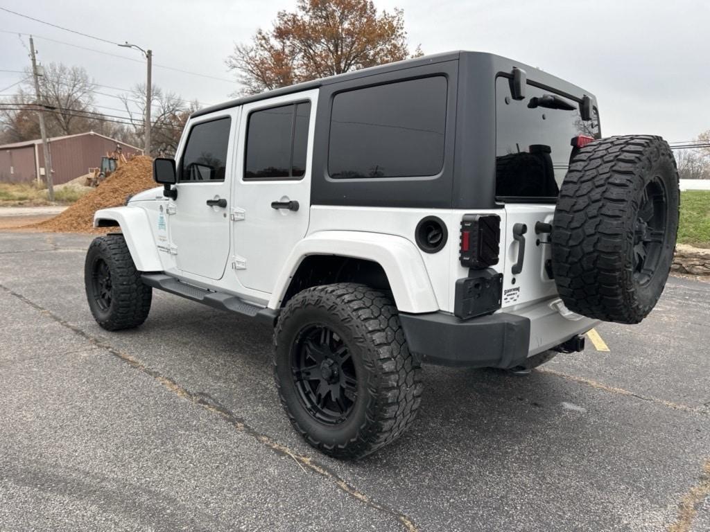 used 2015 Jeep Wrangler Unlimited car, priced at $19,243