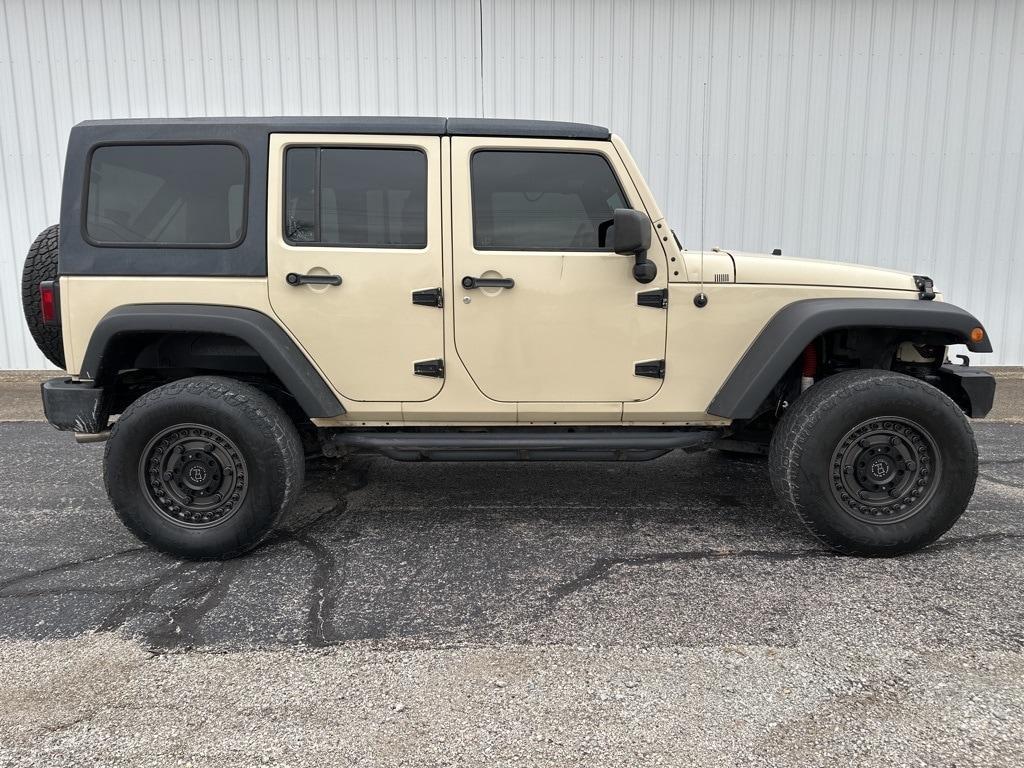 used 2011 Jeep Wrangler Unlimited car, priced at $16,036