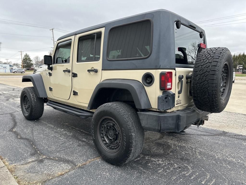 used 2011 Jeep Wrangler Unlimited car, priced at $16,036