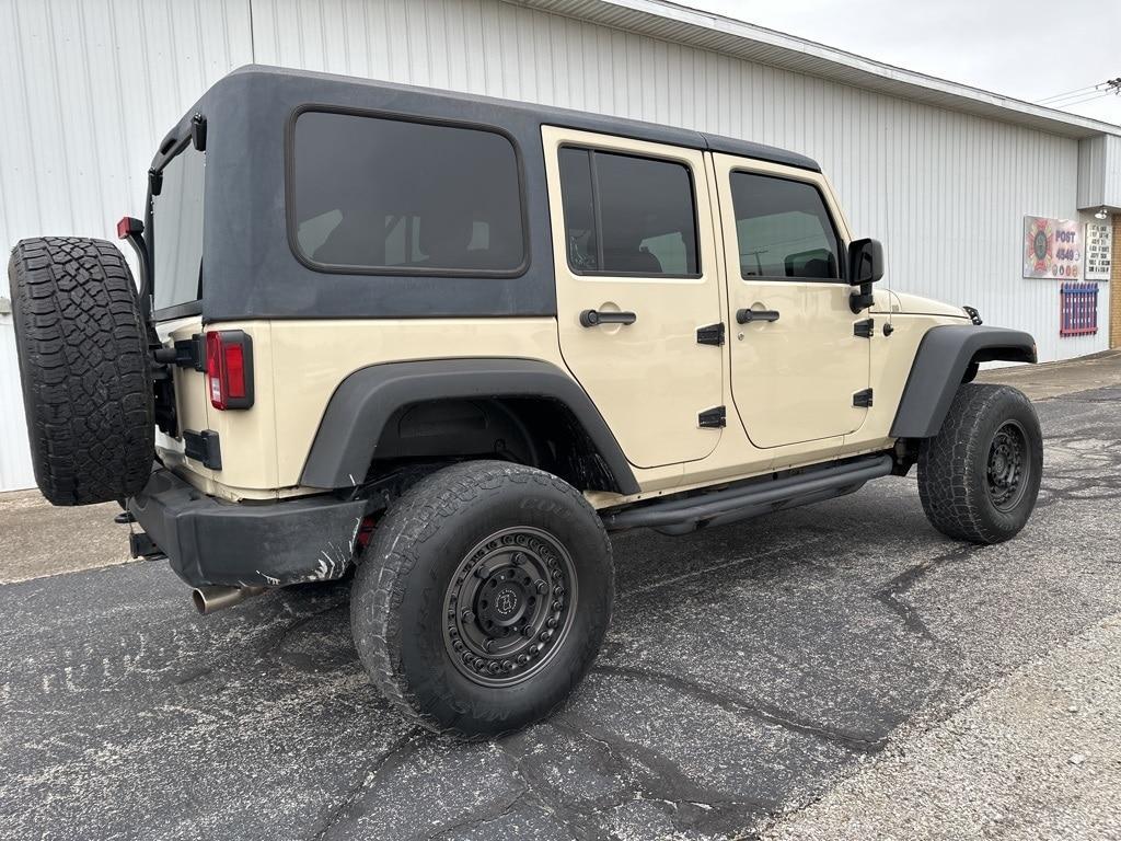 used 2011 Jeep Wrangler Unlimited car, priced at $16,036