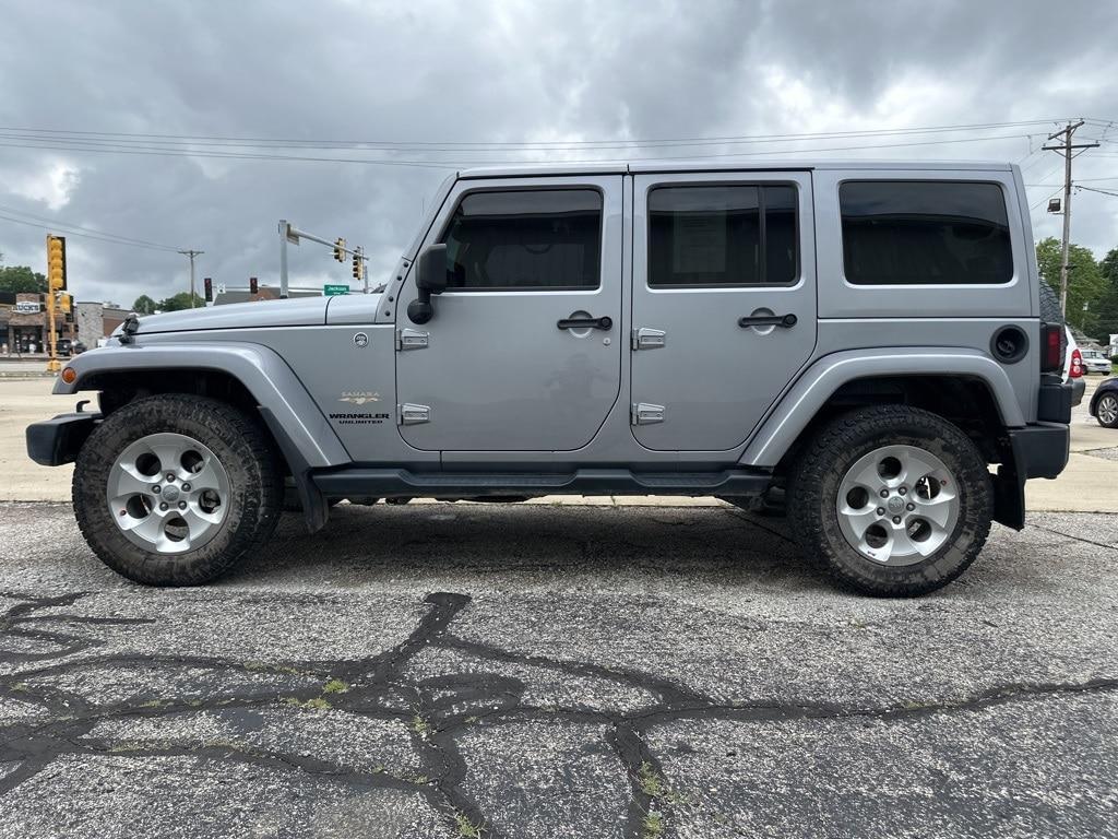 used 2015 Jeep Wrangler Unlimited car, priced at $24,068