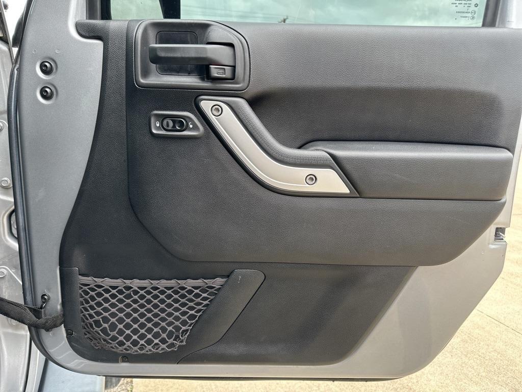 used 2015 Jeep Wrangler Unlimited car, priced at $24,068