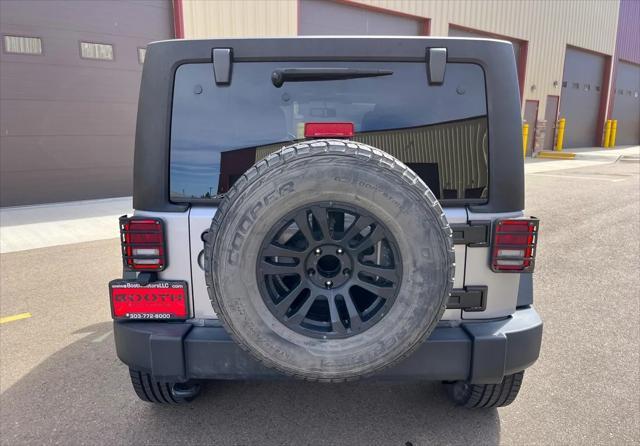 used 2014 Jeep Wrangler Unlimited car, priced at $15,995