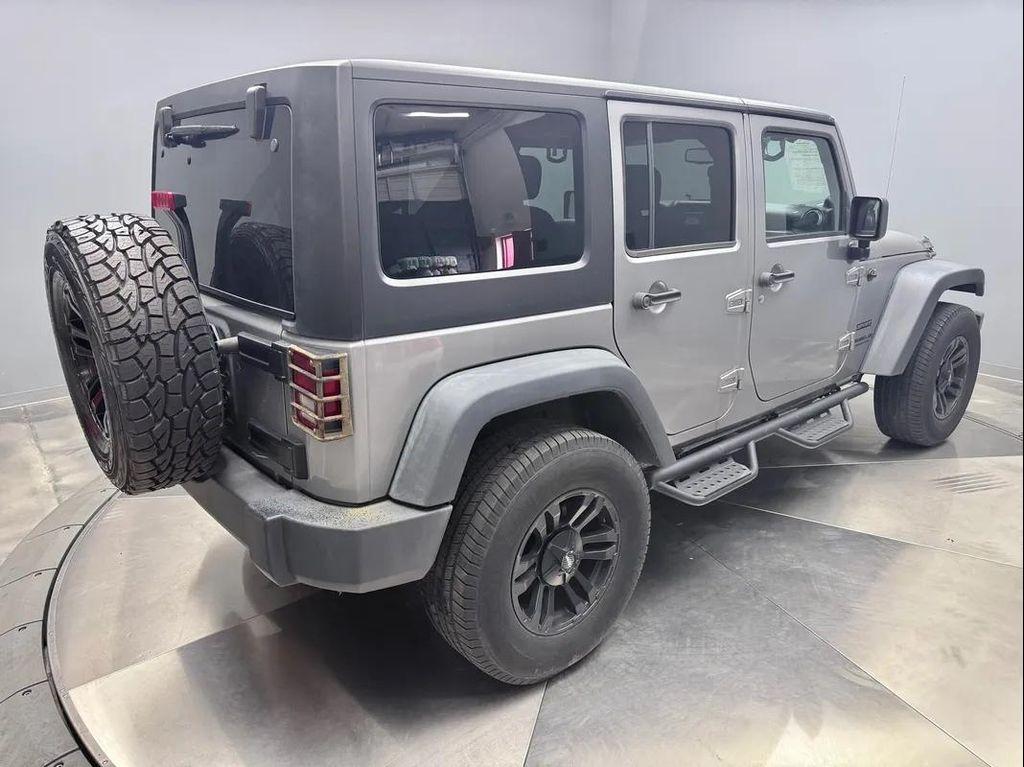 used 2014 Jeep Wrangler Unlimited car, priced at $12,995