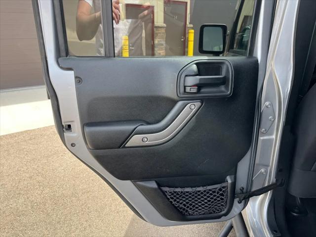 used 2014 Jeep Wrangler Unlimited car, priced at $15,995