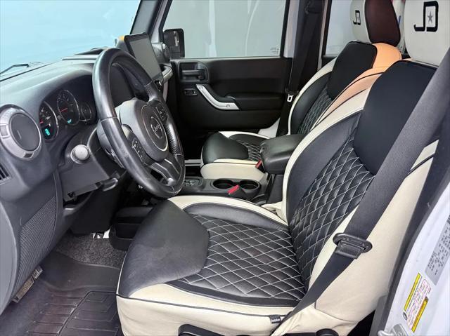 used 2015 Jeep Wrangler Unlimited car, priced at $22,995