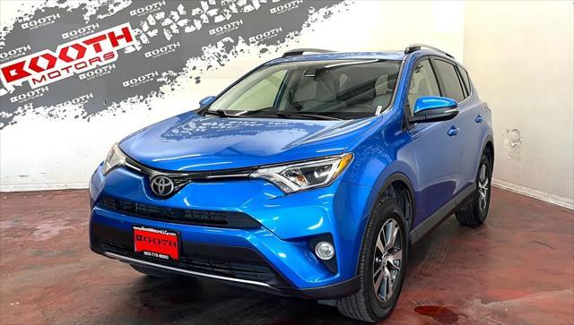 used 2018 Toyota RAV4 car, priced at $18,995