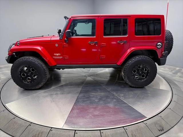 used 2012 Jeep Wrangler Unlimited car, priced at $15,995