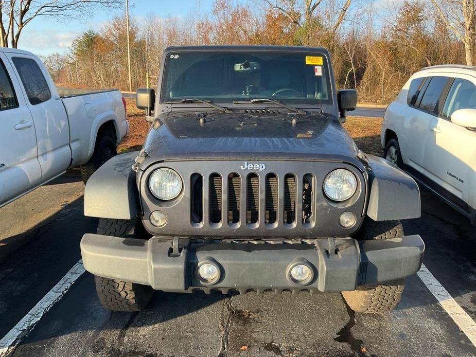 used 2014 Jeep Wrangler Unlimited car, priced at $16,960