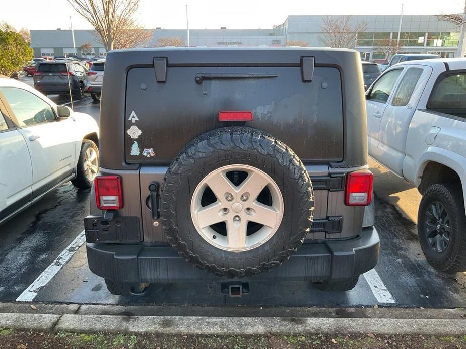 used 2014 Jeep Wrangler Unlimited car, priced at $16,960