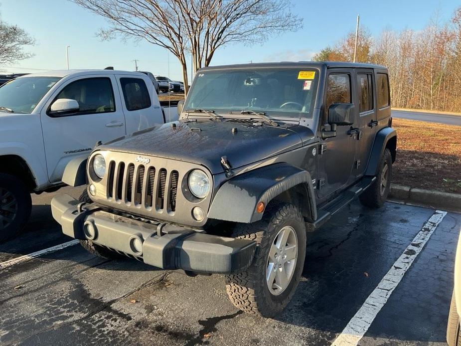 used 2014 Jeep Wrangler Unlimited car, priced at $16,960