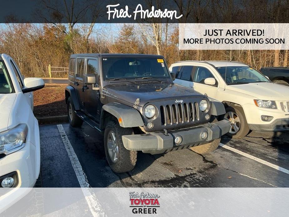 used 2014 Jeep Wrangler Unlimited car, priced at $16,960