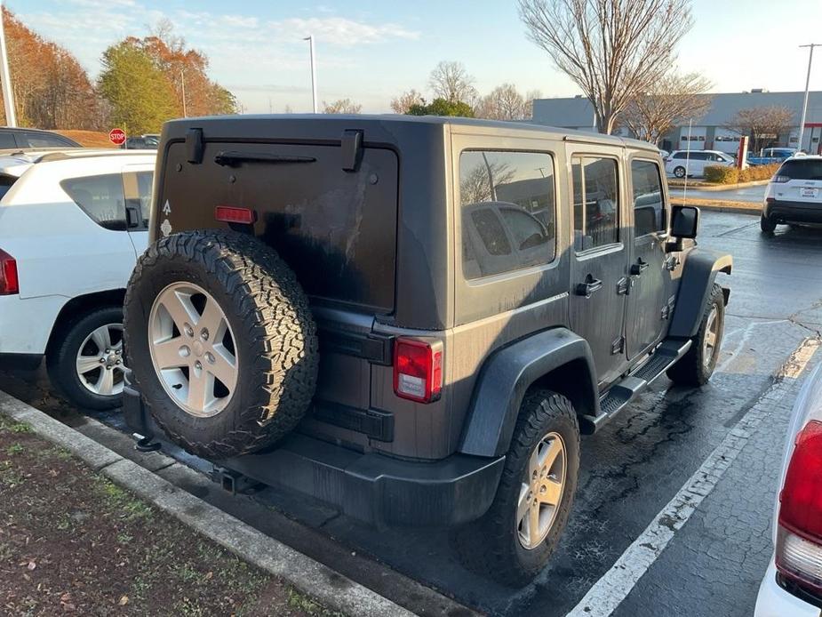 used 2014 Jeep Wrangler Unlimited car, priced at $16,960