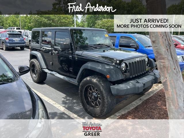 used 2015 Jeep Wrangler Unlimited car, priced at $15,297