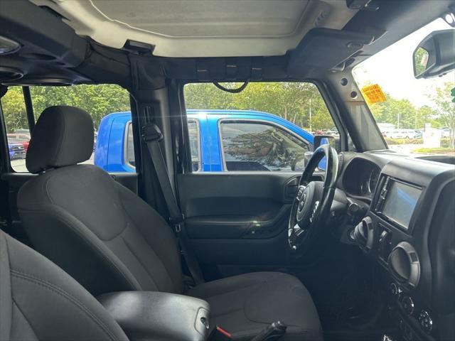 used 2015 Jeep Wrangler Unlimited car, priced at $15,297