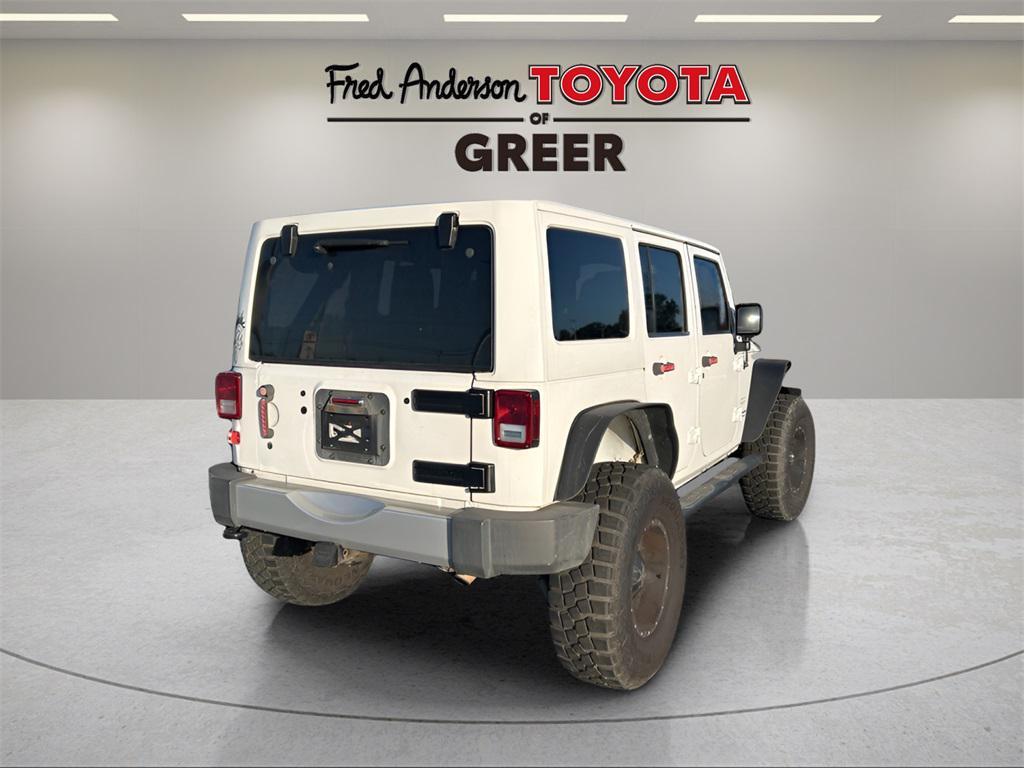 used 2013 Jeep Wrangler Unlimited car, priced at $15,954