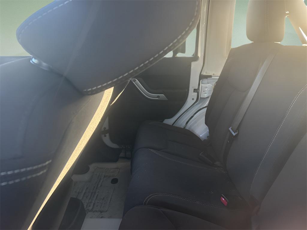 used 2013 Jeep Wrangler Unlimited car, priced at $15,954
