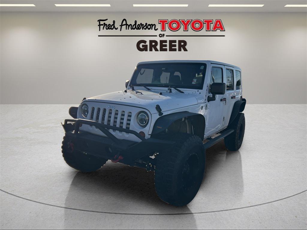 used 2013 Jeep Wrangler Unlimited car, priced at $15,954