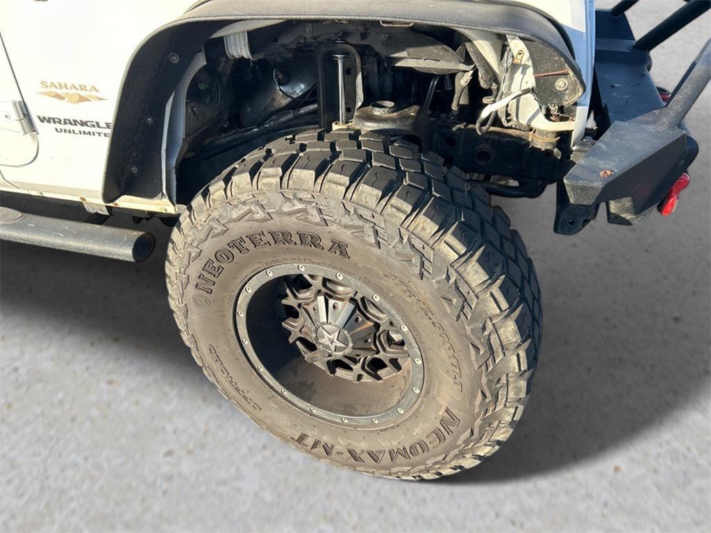 used 2013 Jeep Wrangler Unlimited car, priced at $15,954