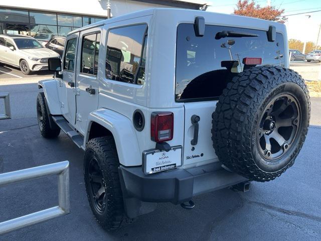 used 2014 Jeep Wrangler Unlimited car, priced at $19,103