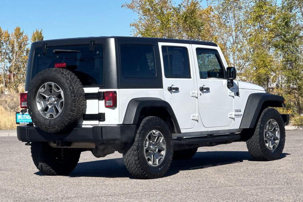 used 2013 Jeep Wrangler Unlimited car, priced at $13,999