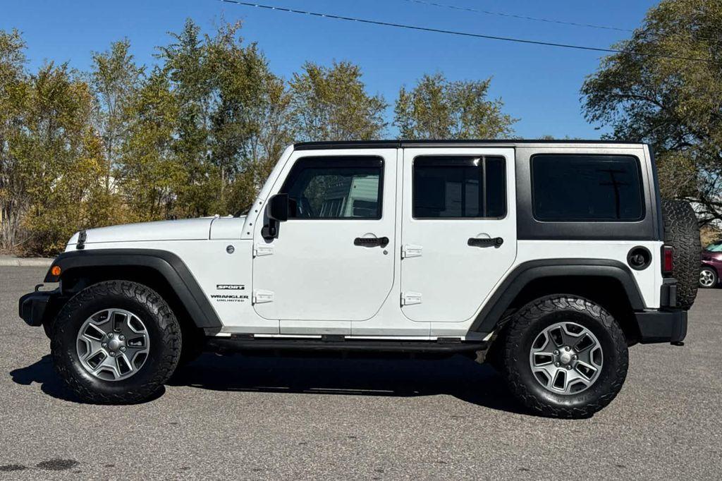 used 2013 Jeep Wrangler Unlimited car, priced at $13,999
