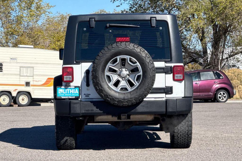 used 2013 Jeep Wrangler Unlimited car, priced at $13,999