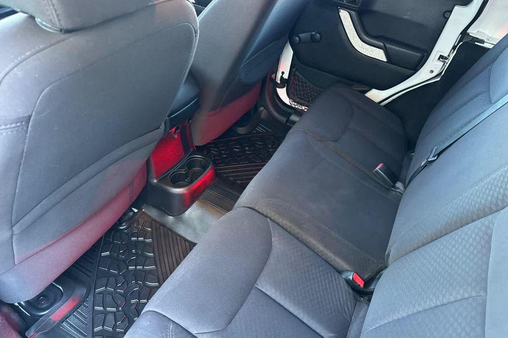 used 2013 Jeep Wrangler Unlimited car, priced at $13,999