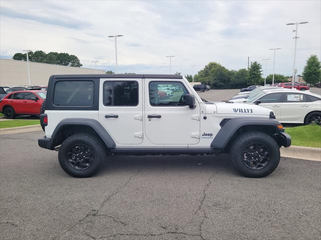 used 2023 Jeep Wrangler 4xe car, priced at $27,588