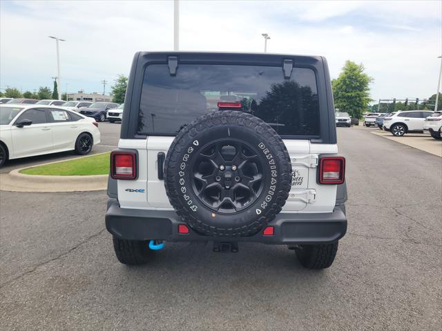 used 2023 Jeep Wrangler 4xe car, priced at $27,588