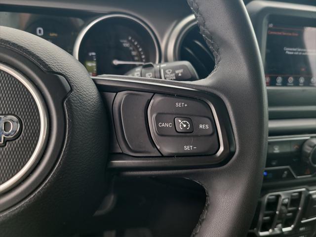 used 2023 Jeep Wrangler 4xe car, priced at $27,588