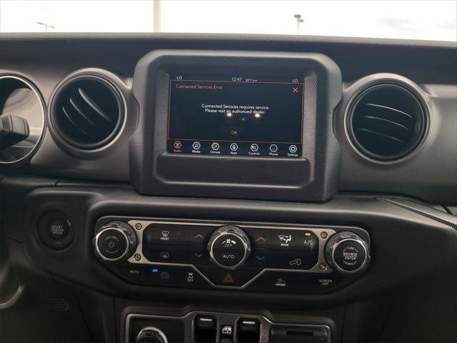 used 2023 Jeep Wrangler 4xe car, priced at $27,588