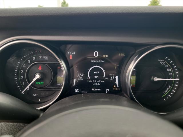 used 2023 Jeep Wrangler 4xe car, priced at $27,588