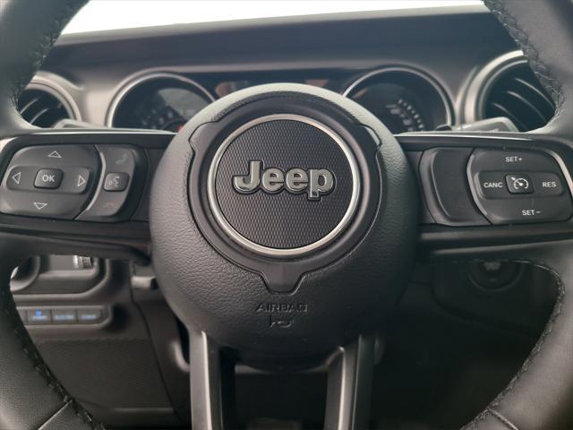 used 2023 Jeep Wrangler 4xe car, priced at $27,588