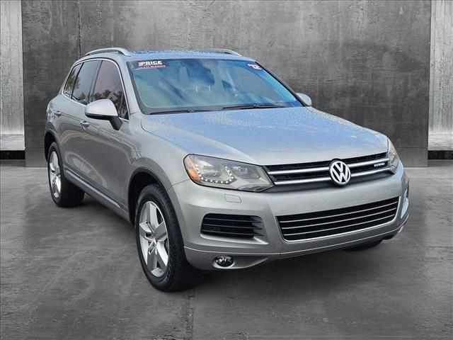 used 2012 Volkswagen Touareg Hybrid car, priced at $9,853