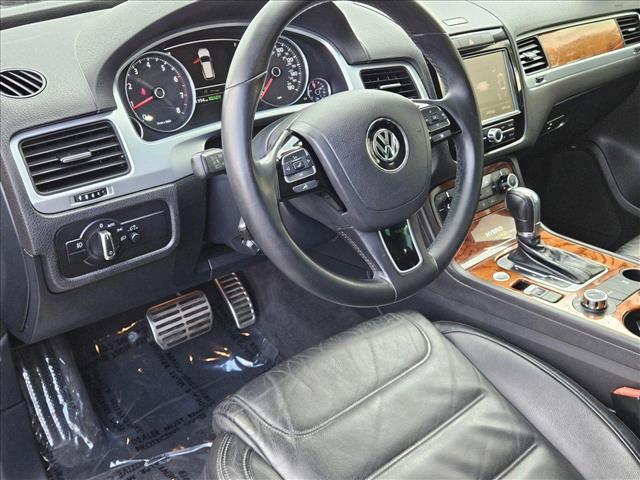 used 2012 Volkswagen Touareg Hybrid car, priced at $9,853