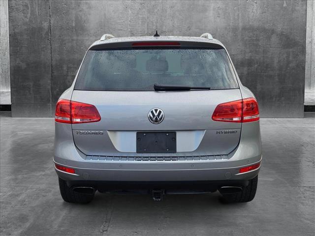 used 2012 Volkswagen Touareg Hybrid car, priced at $9,853