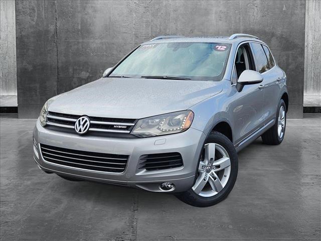 used 2012 Volkswagen Touareg Hybrid car, priced at $9,853