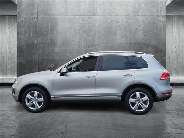 used 2012 Volkswagen Touareg Hybrid car, priced at $9,853