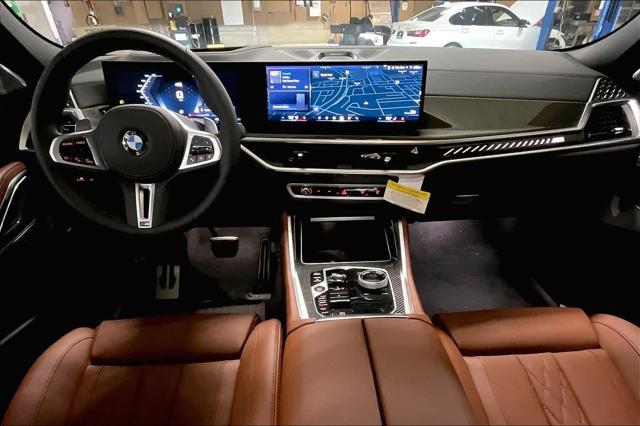 new 2025 BMW X6 car, priced at $111,405